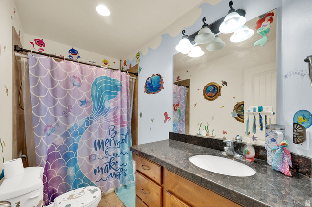 2026 Cres Drive South Mapleton, UT 84664 - Photo 12 of 18 Full bath with vanity, a shower with curtain, and light tile patterned floors