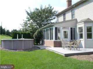 3014 Regency Drive Sinking Spring, PA 19608 - Photo 2 of 6 a view of house with patio and a garden