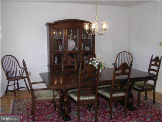 3014 Regency Drive Sinking Spring, PA 19608 - Photo 6 of 6 a view of a dining room with furniture and chandelier