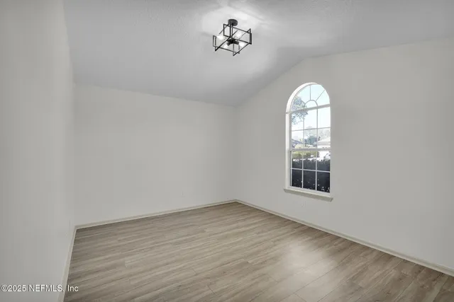 an empty room with windows