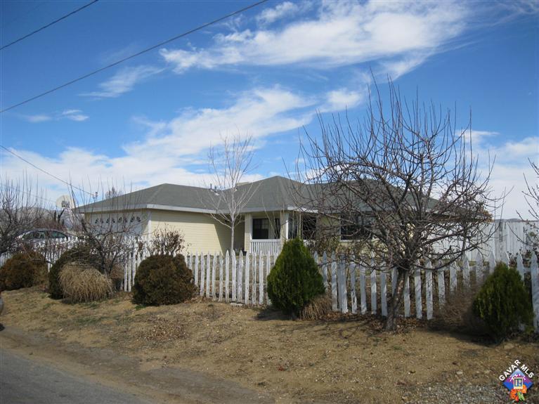 21720 Woodford-Tehachapi Road Tehachapi, CA 93561 - Photo 1 of 1 a view of a house with a yard