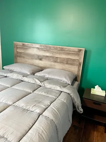 a bathroom with a toilet a sink and a mirror