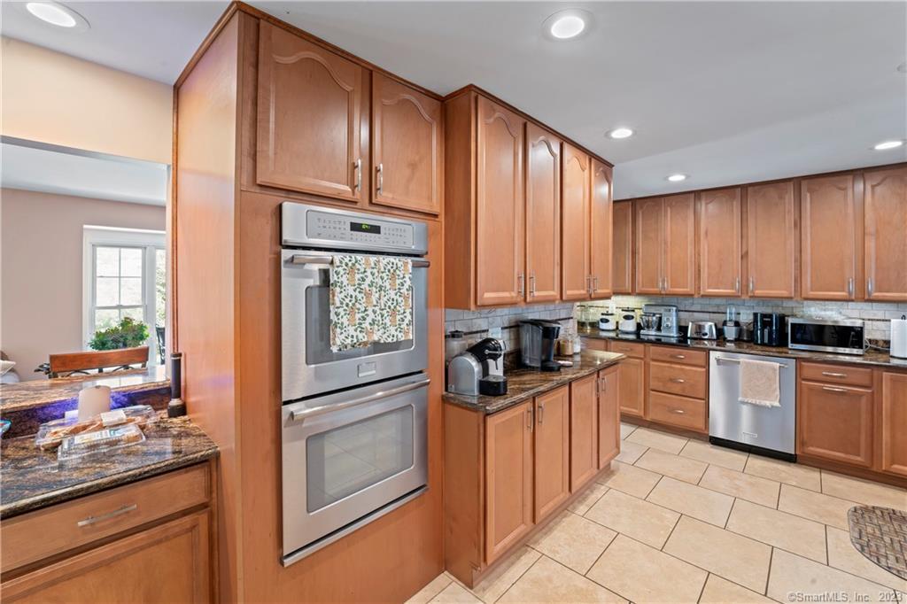 23 Sunset Hill Road Brookfield, CT 06804 - Photo 13 of 40 a kitchen with granite countertop stainless steel appliances and cabinets