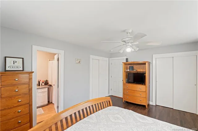 a bathroom with a sink vanity and a mirror