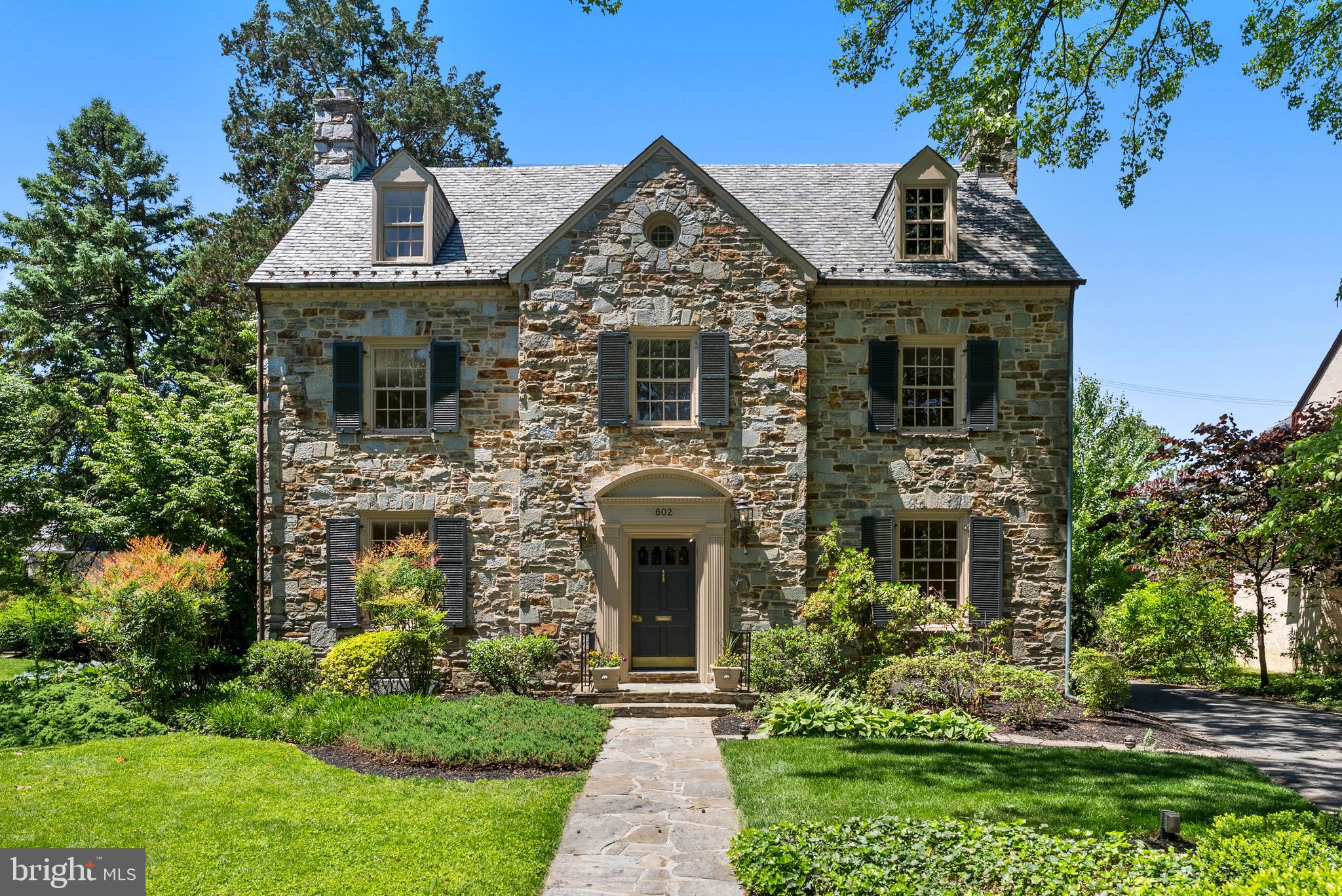 602 Stoneleigh Road Baltimore, MD 21212 - Photo 1 of 31 a front view of a house with garden