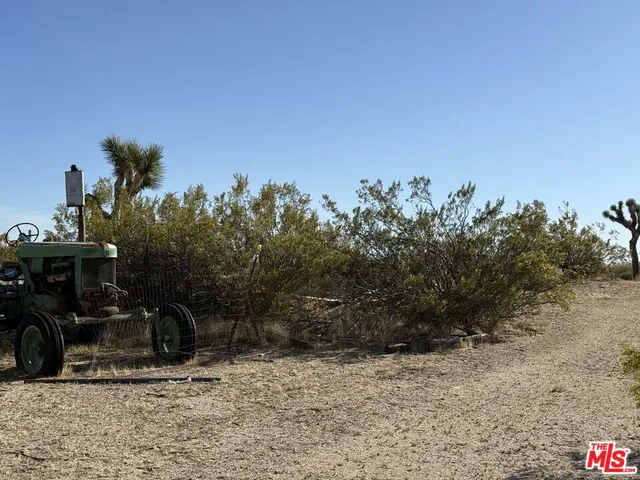 a kitchen with stainless steel appliances granite countertop a stove and a cabinets
