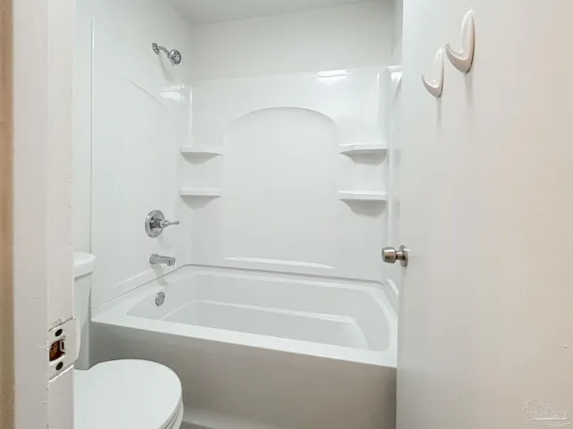 a bathroom with a sink vanity and a mirror