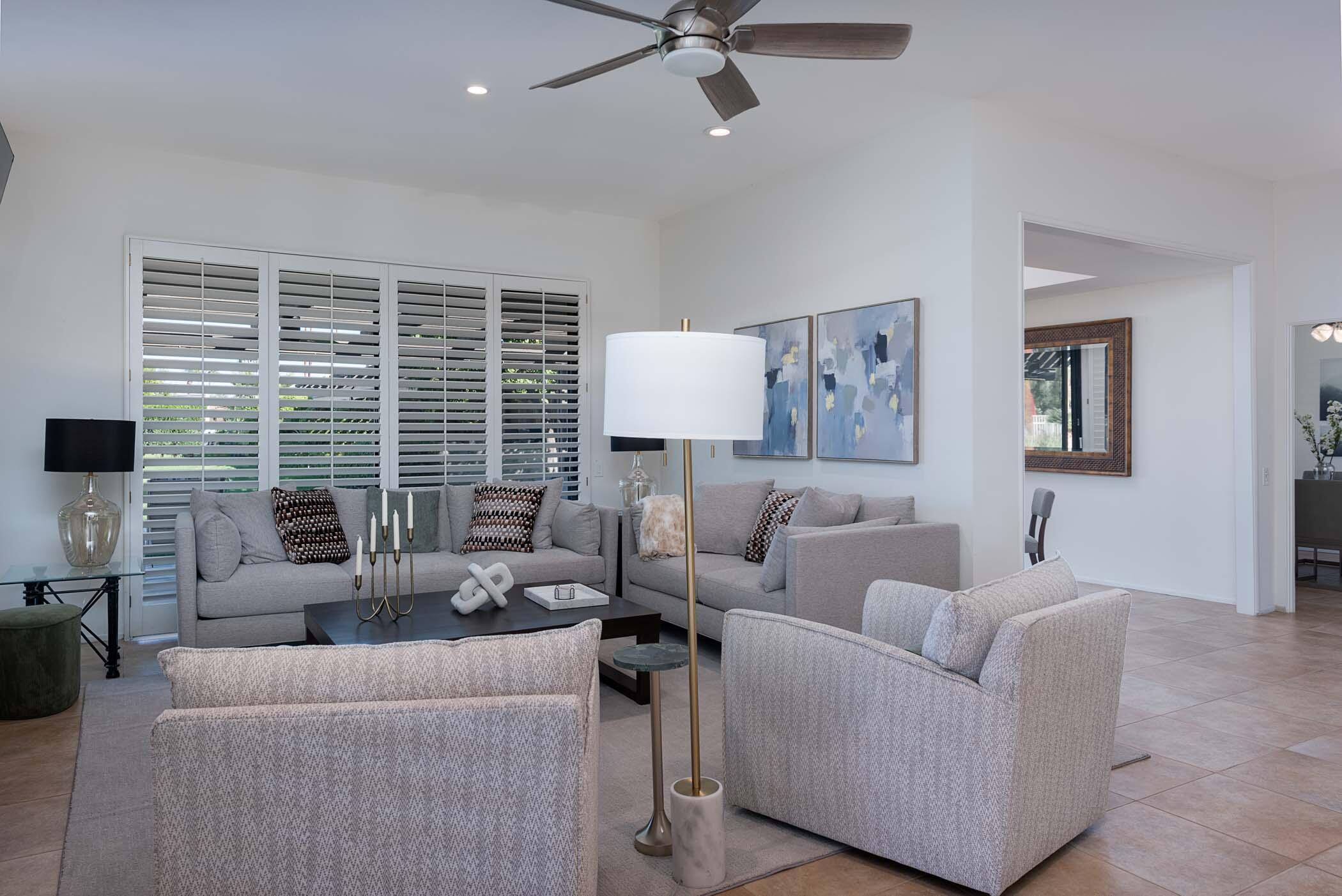 2 Lehigh Court Rancho Mirage, CA 92270 - Photo 18 of 43 a living room with furniture and a large window