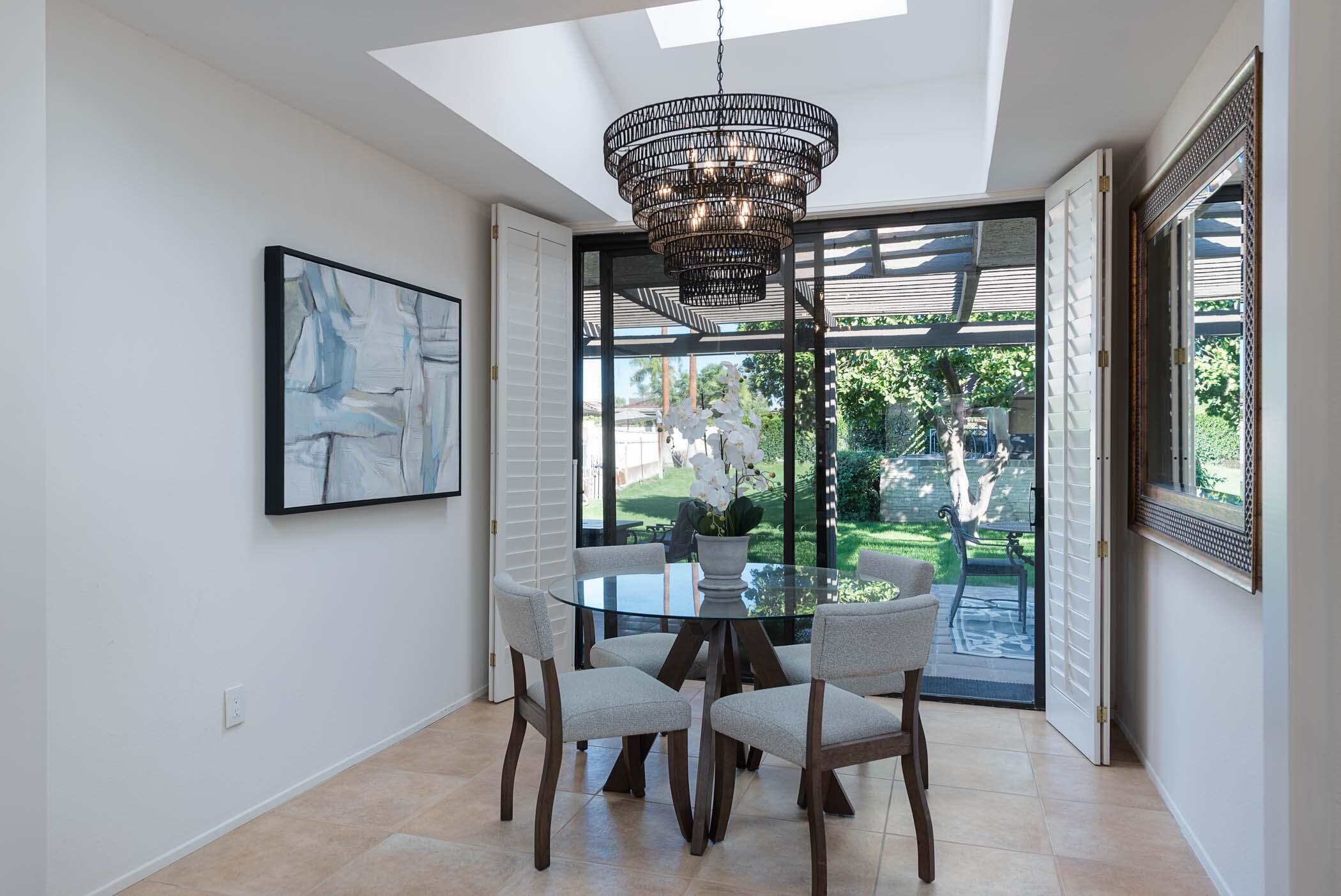 2 Lehigh Court Rancho Mirage, CA 92270 - Photo 19 of 43 a view of a dining room with furniture window and outside view