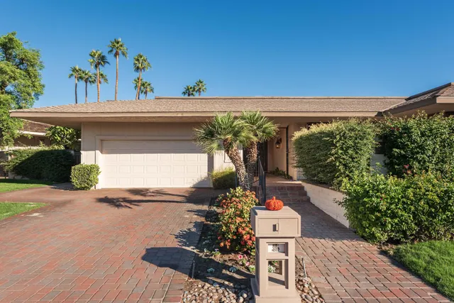 a front view of a house with a porch