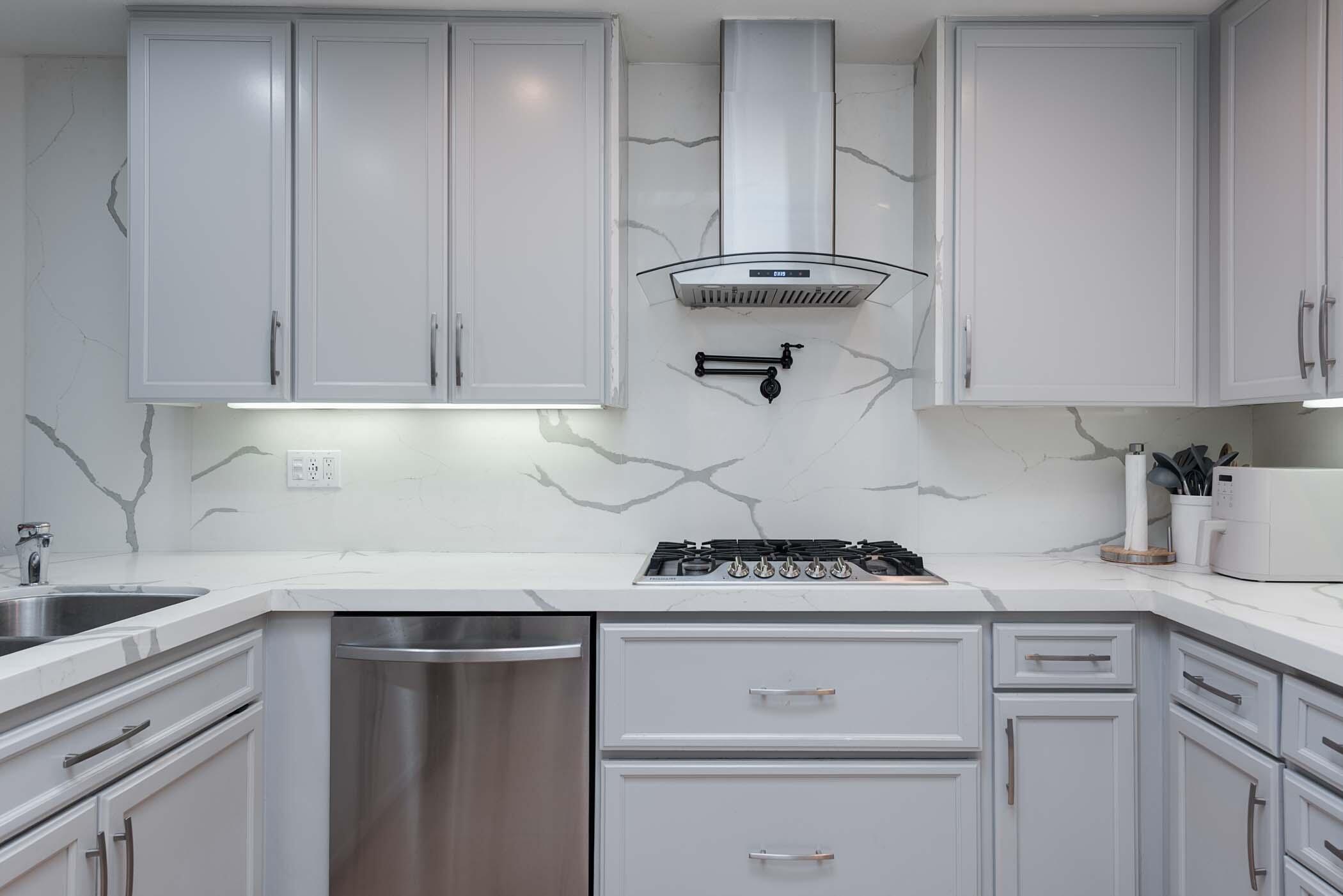 2 Lehigh Court Rancho Mirage, CA 92270 - Photo 22 of 43 a kitchen with appliances cabinets and a counter top space