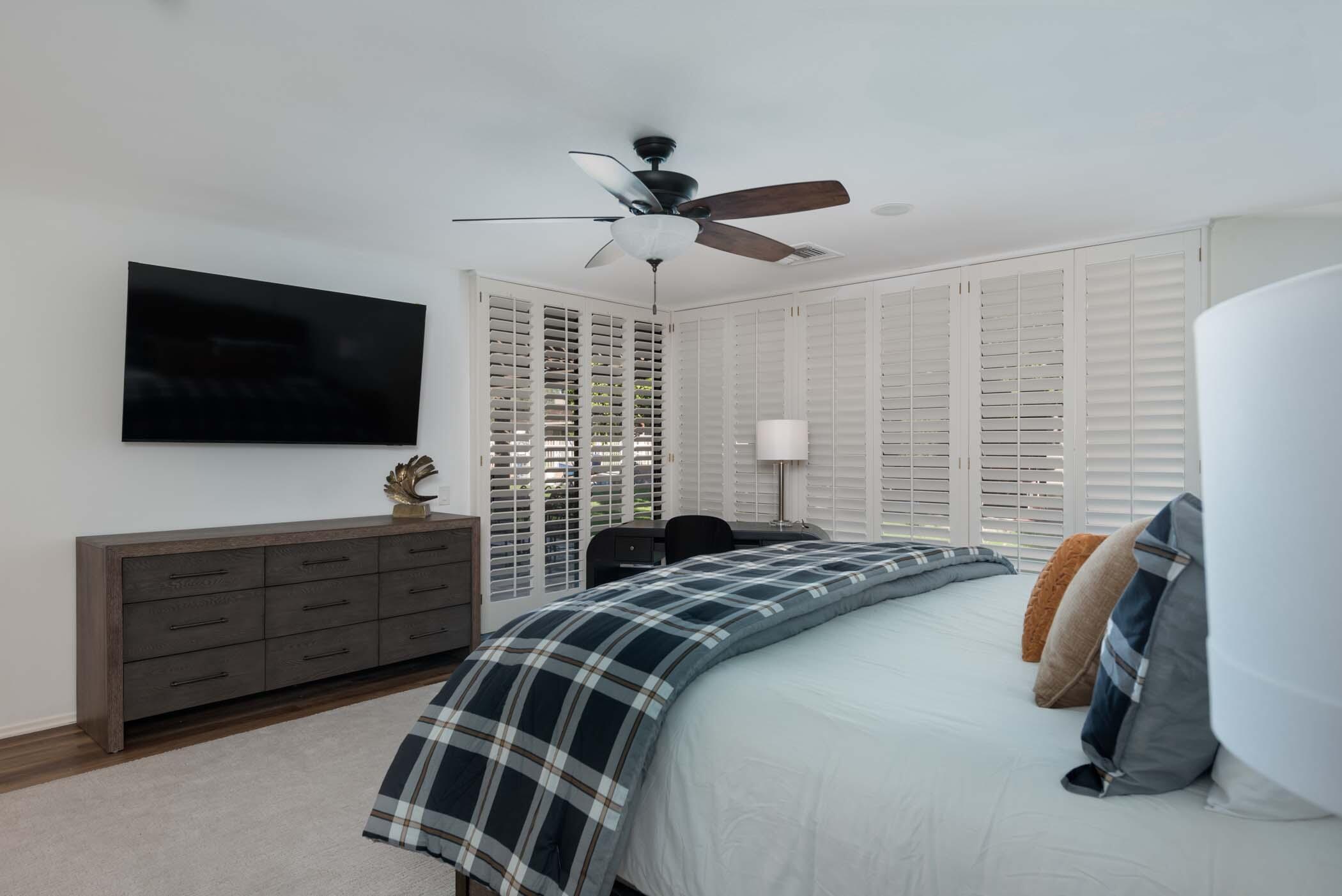 2 Lehigh Court Rancho Mirage, CA 92270 - Photo 26 of 43 a bedroom with a bed and a flat screen tv