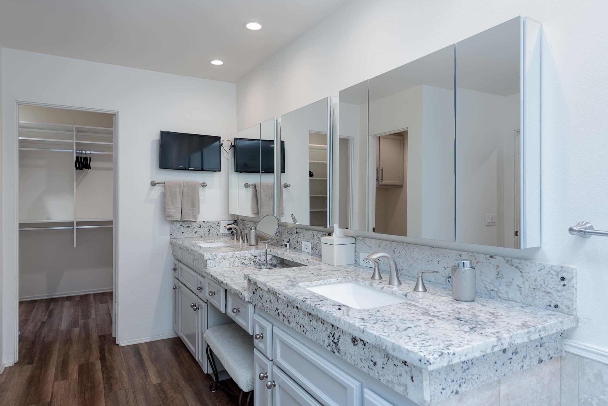 2 Lehigh Court Rancho Mirage, CA 92270 - Photo 28 of 43 a bathroom with a sink and a mirror