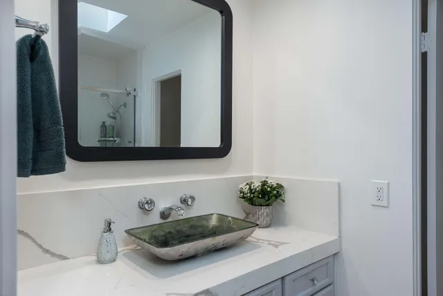 a view of a bathroom with a glass door