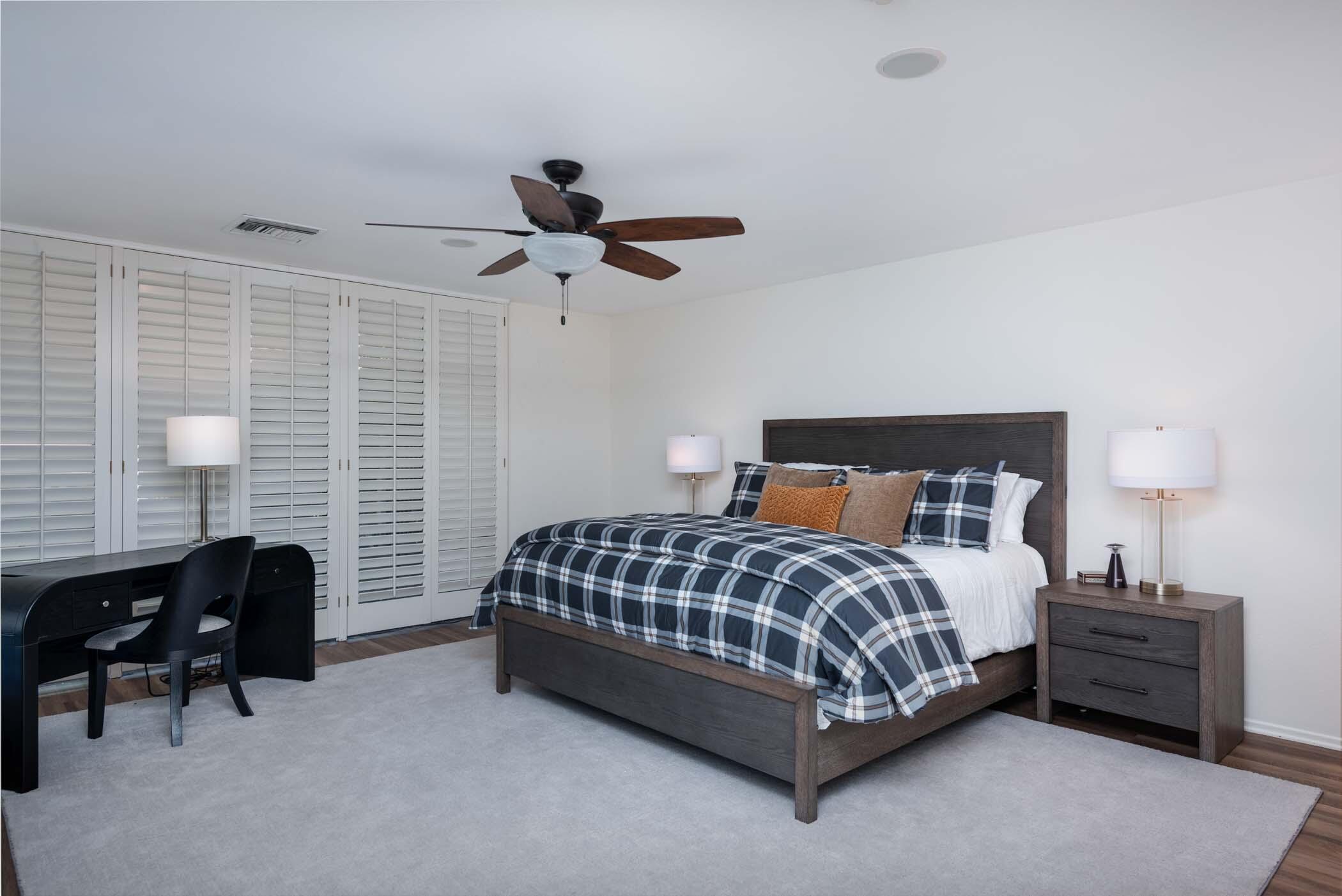 2 Lehigh Court Rancho Mirage, CA 92270 - Photo 6 of 43 a bedroom with a bed and a chair