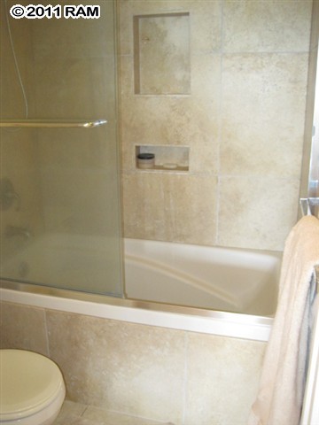 2575 South Kihei Road, Unit G307 Kihei, HI 96753 - Photo 11 of 25 a bathroom with a toilet and shower