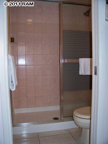 2575 South Kihei Road, Unit G307 Kihei, HI 96753 - Photo 16 of 25 a bathroom with a shower and a toilet