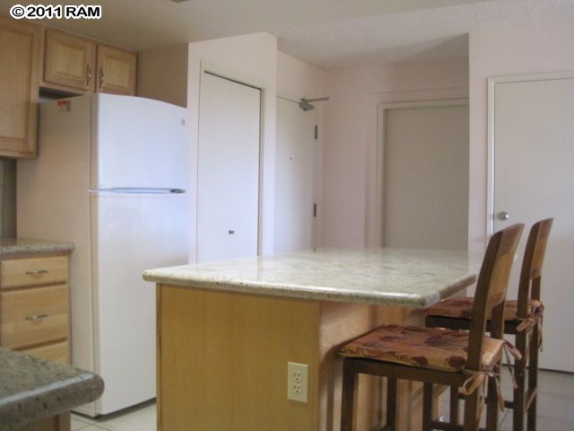 2575 South Kihei Road, Unit G307 Kihei, HI 96753 - Photo 3 of 25 a view of kitchen with cabinets