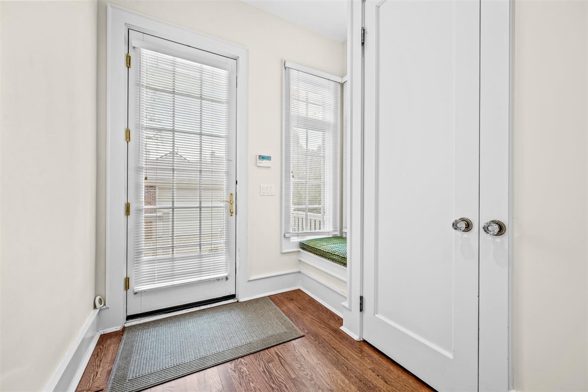 224 Sheridan Road Kenilworth, IL 60043 - Photo 25 of 62 an empty room with wooden floor cabinet and windows