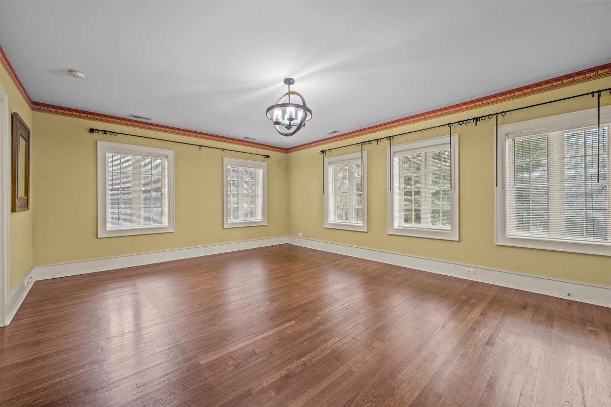 224 Sheridan Road Kenilworth, IL 60043 - Photo 39 of 62 a view of livingroom with window wooden floor and front door