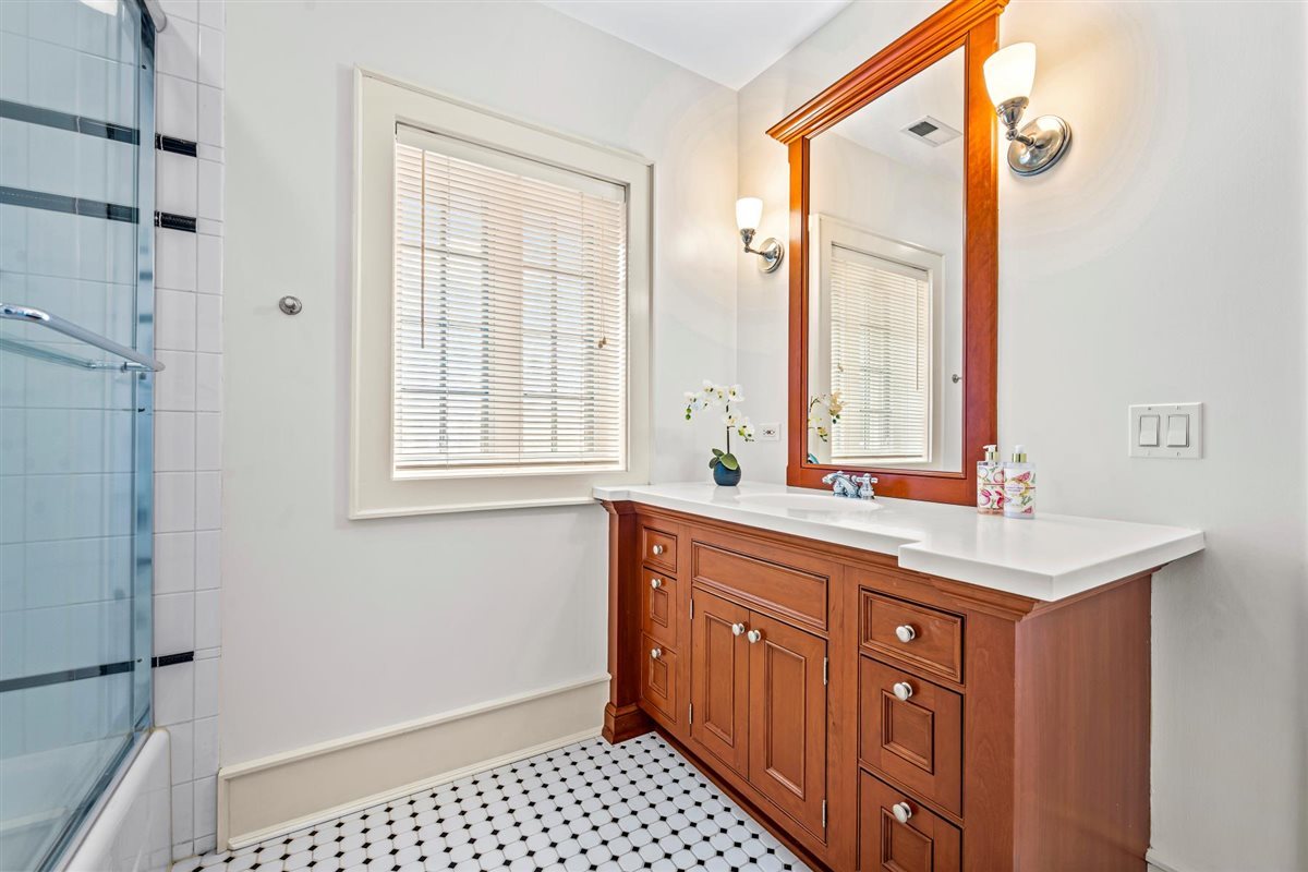 224 Sheridan Road Kenilworth, IL 60043 - Photo 40 of 62 a kitchen with stainless steel appliances a sink and a window