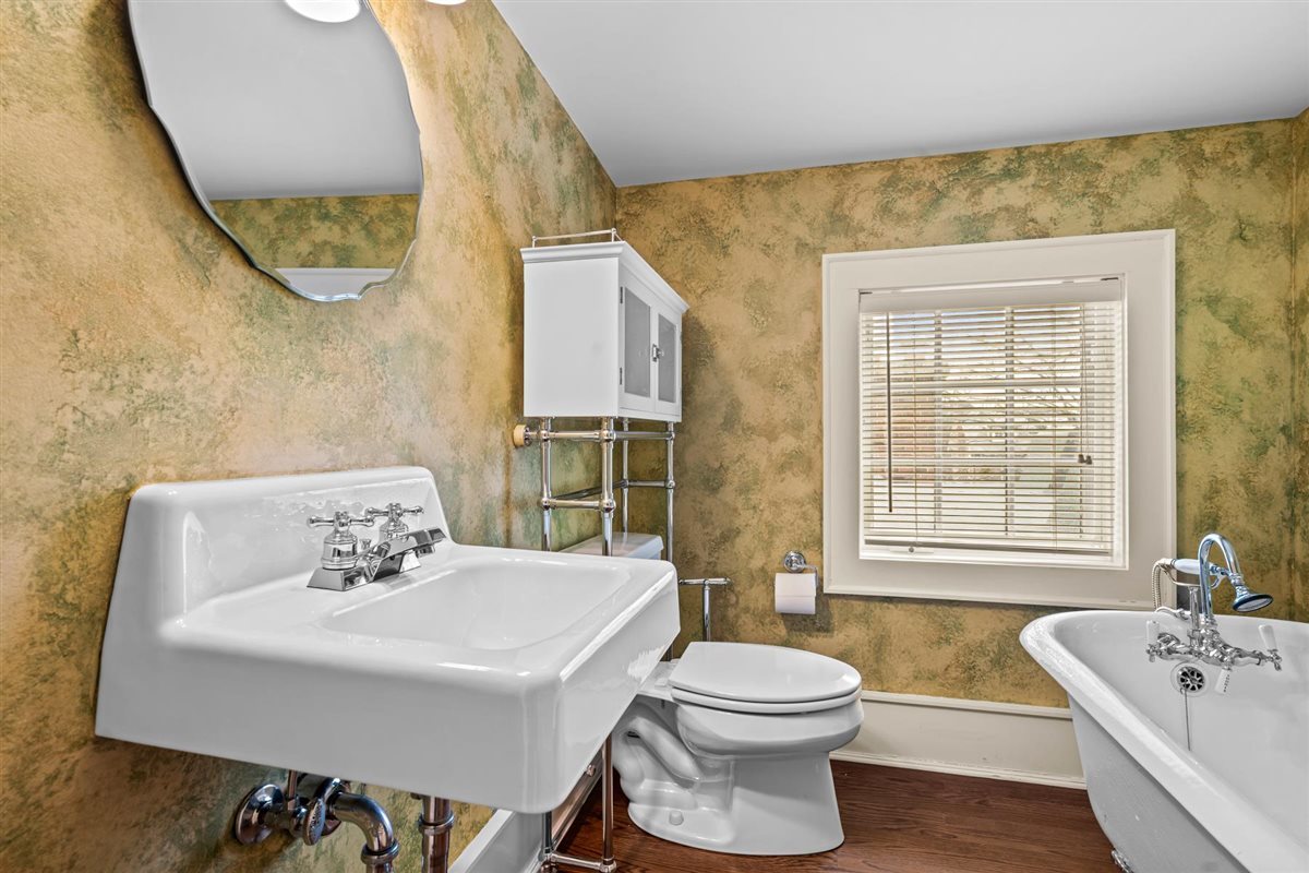 224 Sheridan Road Kenilworth, IL 60043 - Photo 48 of 62 a bathroom with a sink and a mirror