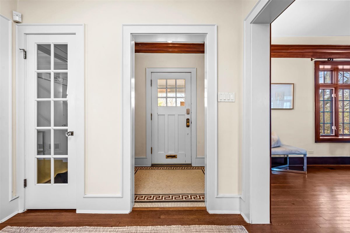 224 Sheridan Road Kenilworth, IL 60043 - Photo 8 of 62 a view of a livingroom with wooden floor and a window