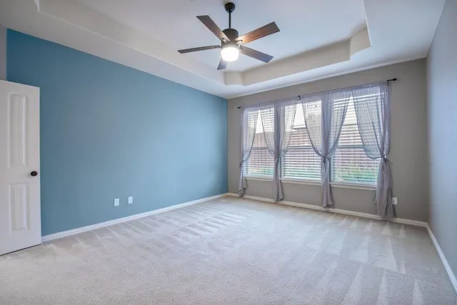 a view of kitchen with sink microwave refrigerator and stove