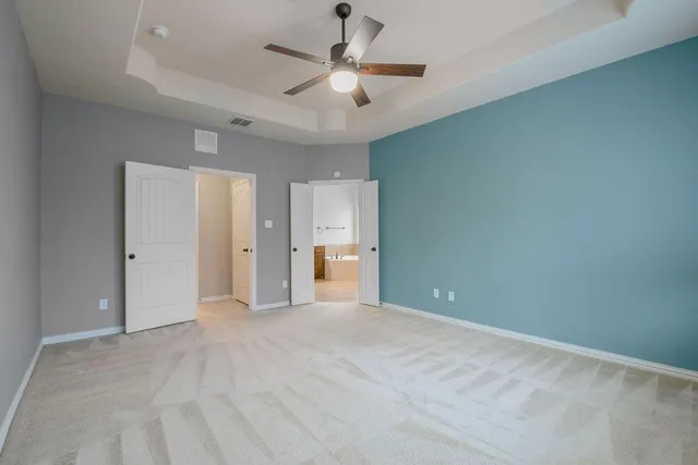 a view of a livingroom with a fireplace and a flat screen tv