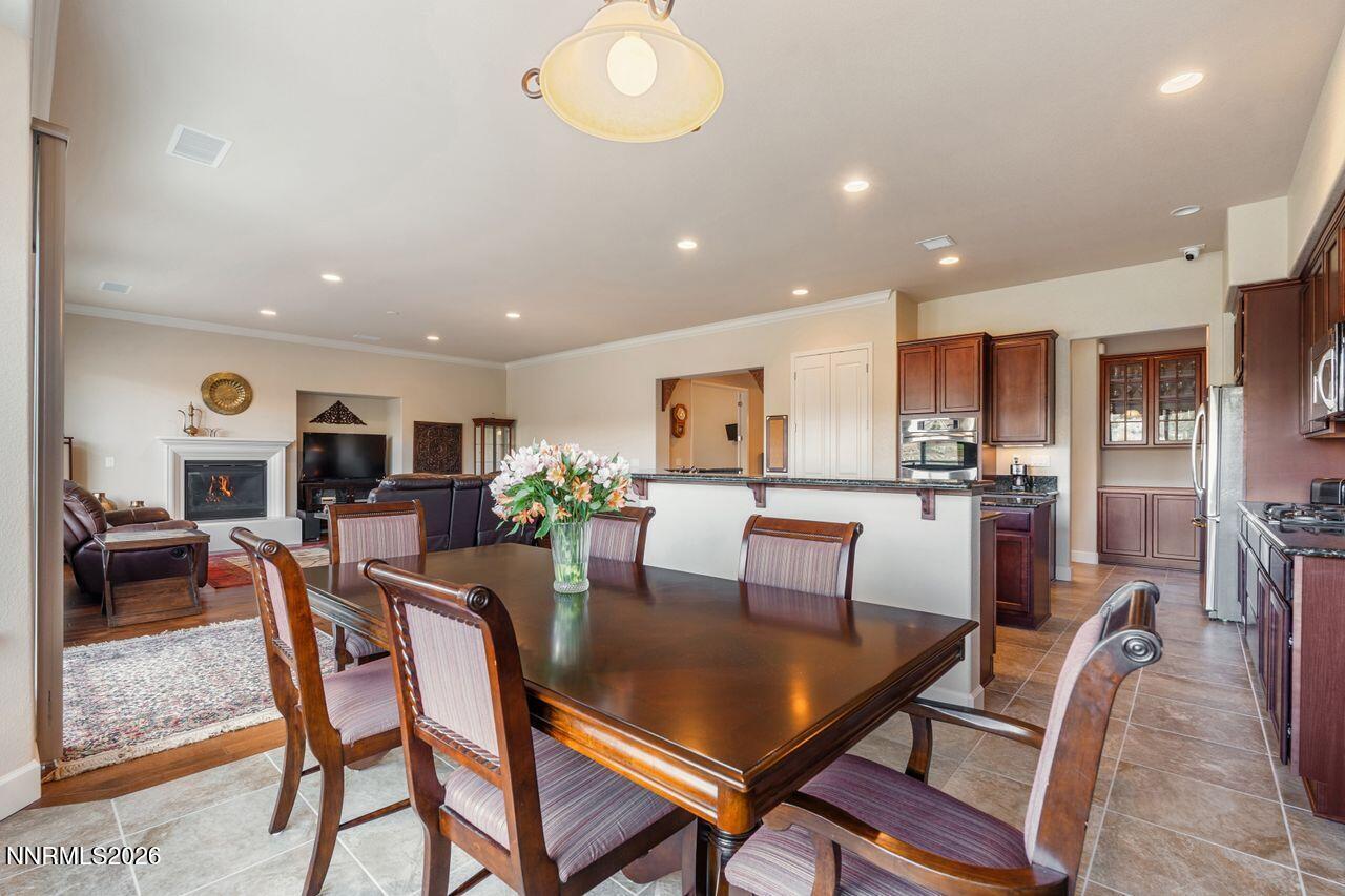 9325 Wrenwood Court Reno, NV 89523 - Photo 12 of 34 dining with flame