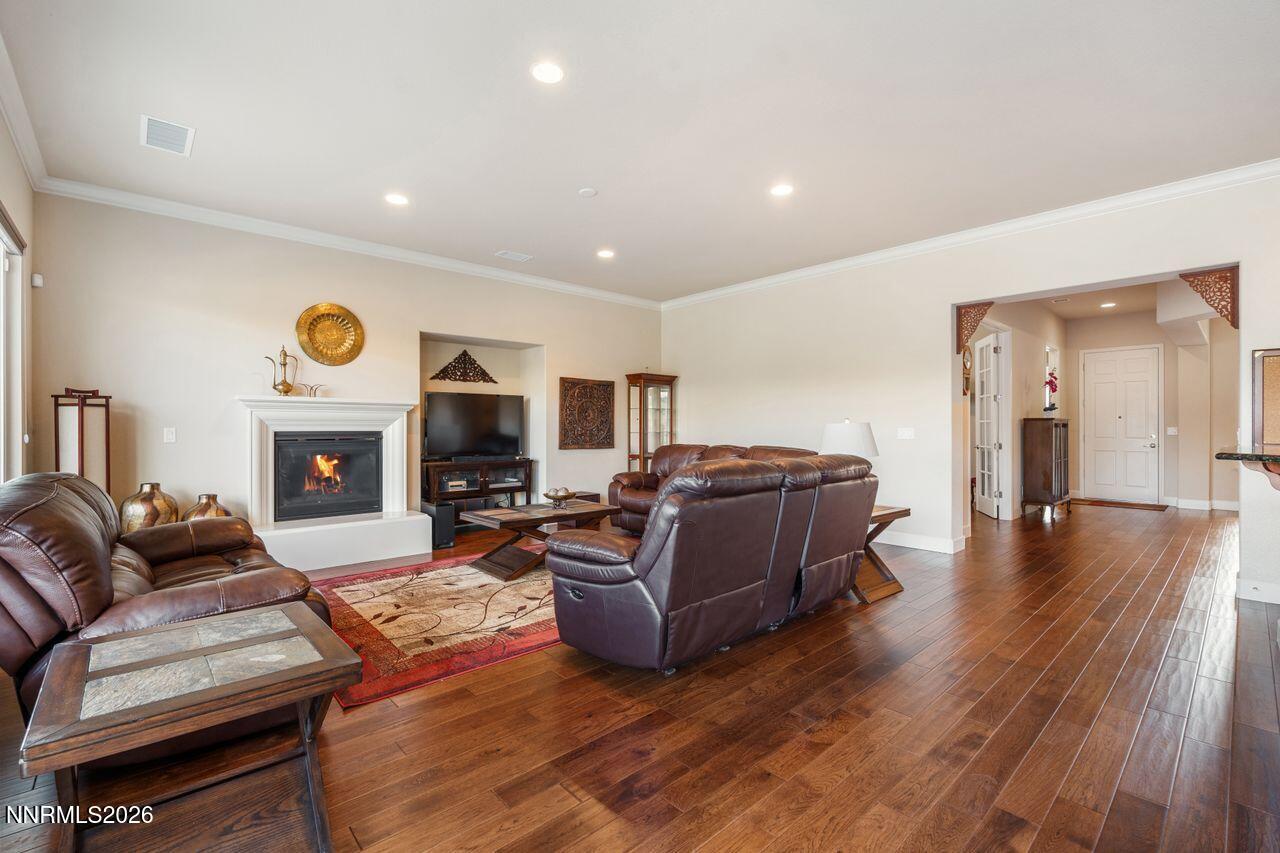 9325 Wrenwood Court Reno, NV 89523 - Photo 5 of 34 Living room couches and fire