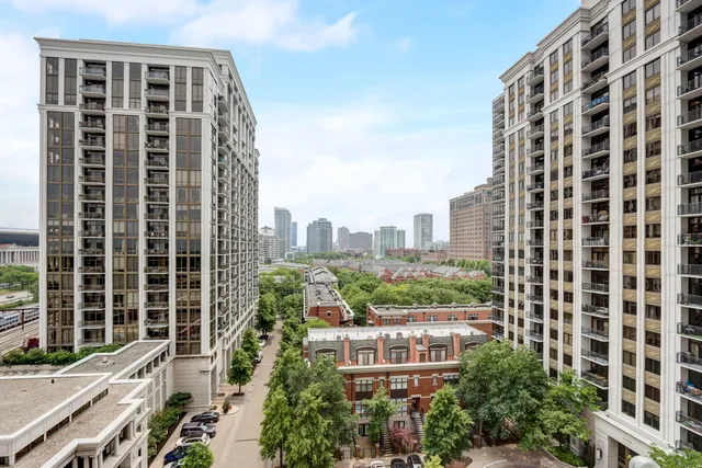a view of a city with tall buildings