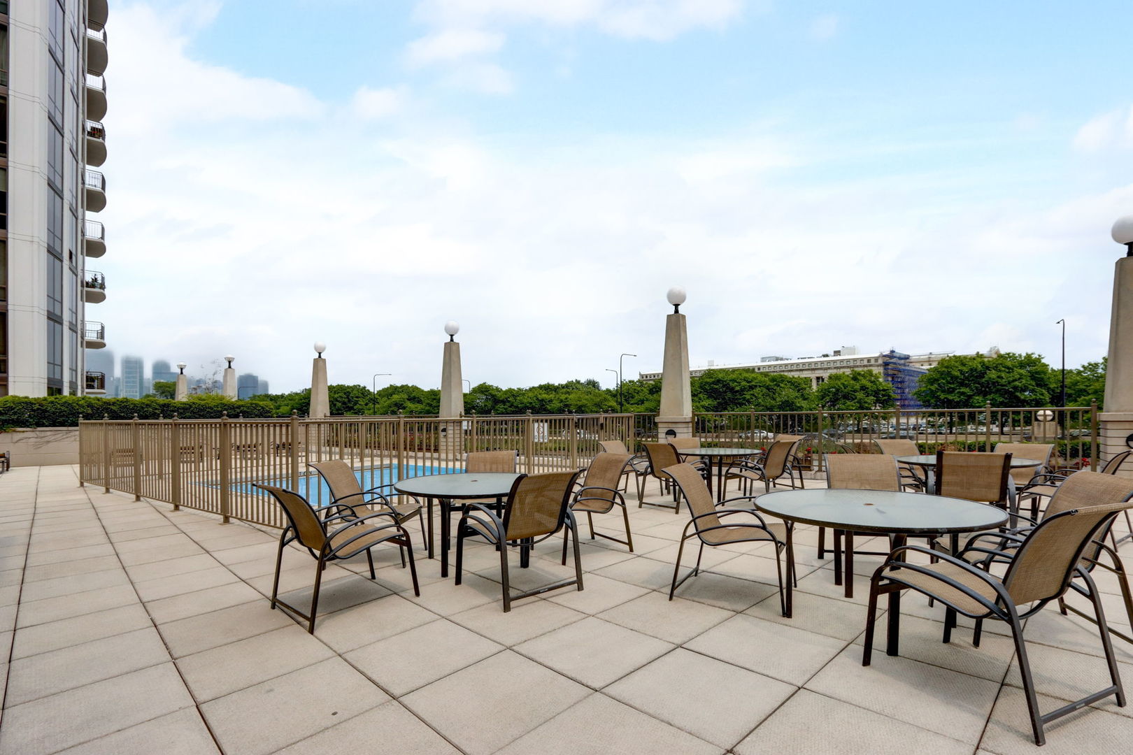 233 East 13th Street, Unit 1008 Chicago, IL 60605 - Photo 16 of 27 a view of a terrace with furniture and a lake view