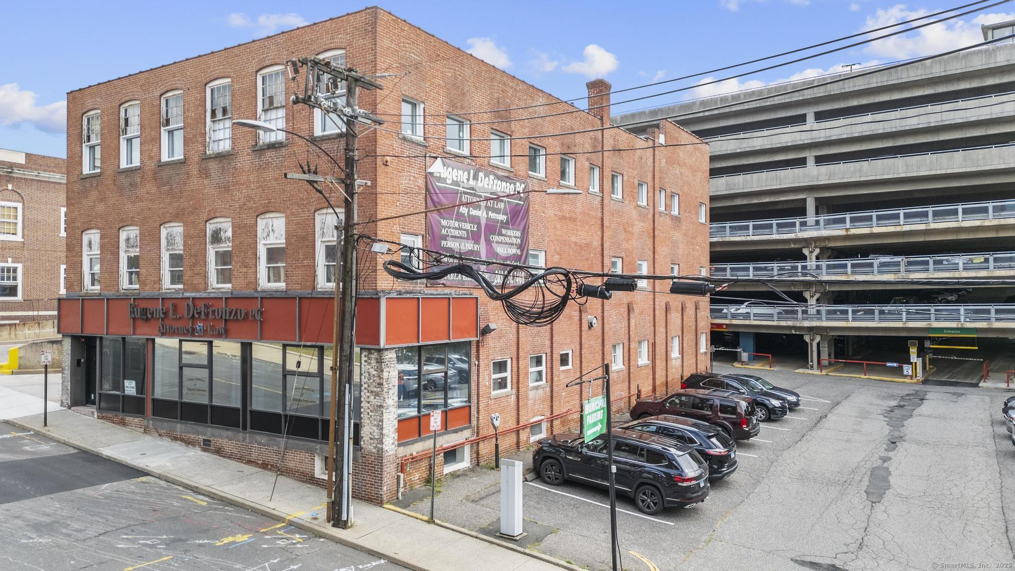 61 Field Street, Unit 310 Waterbury, CT 06702 - Photo 7 of 12 a view of a tall building the ocean view