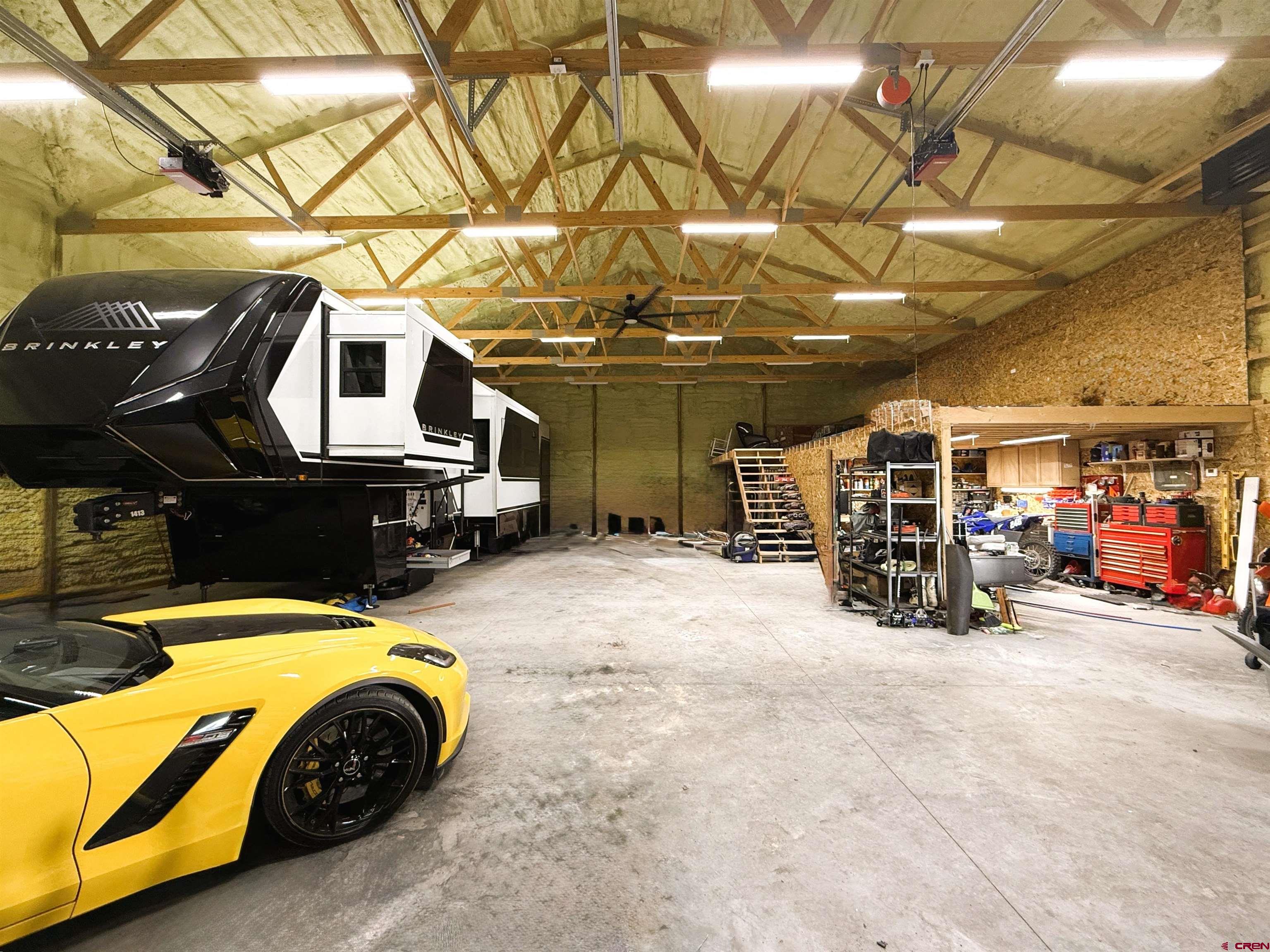 8585 Ellens Way Austin, CO 81410 - Photo 11 of 45 a view of a garage with storage