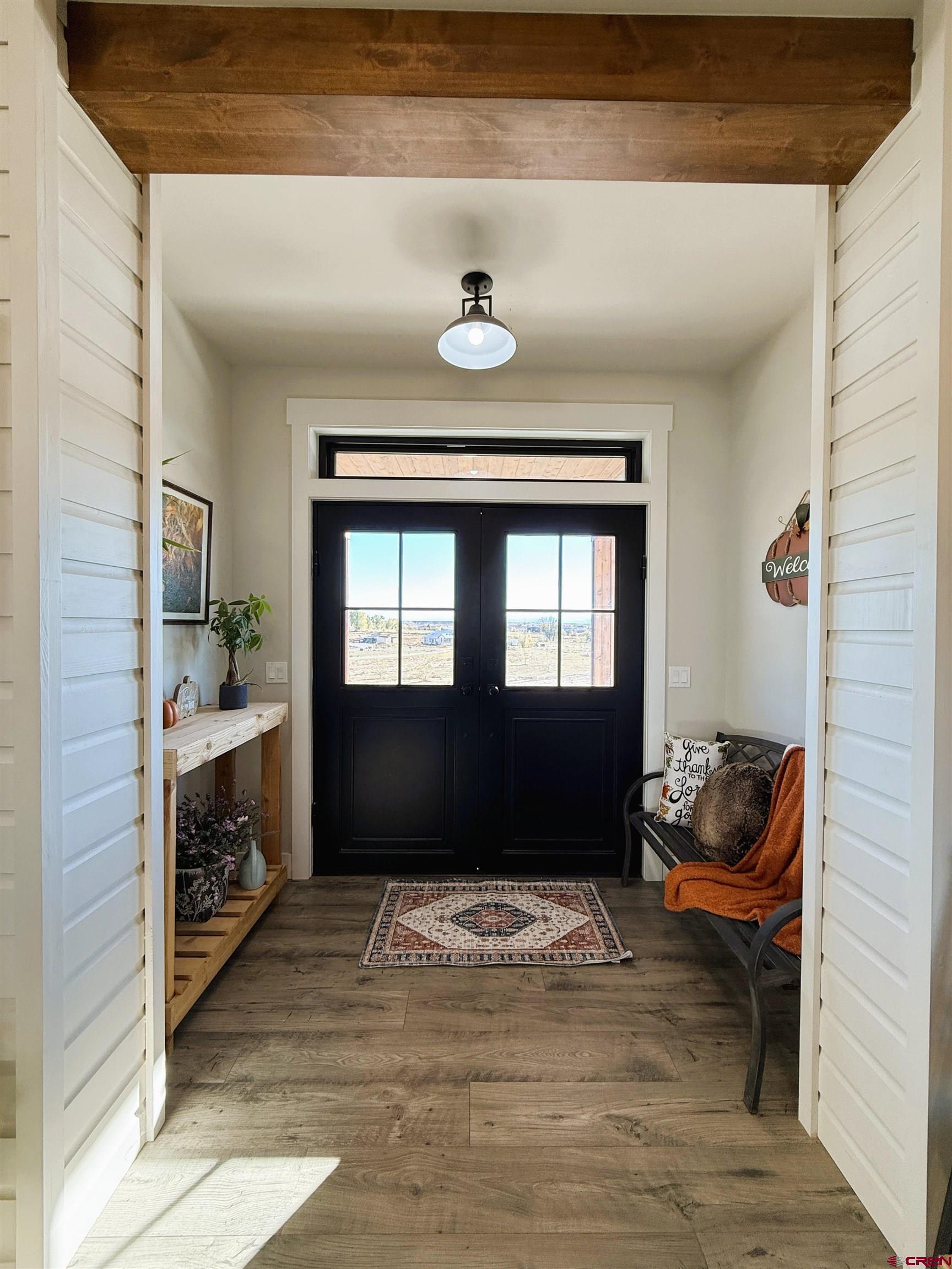 8585 Ellens Way Austin, CO 81410 - Photo 12 of 45 a living room with furniture and a fireplace