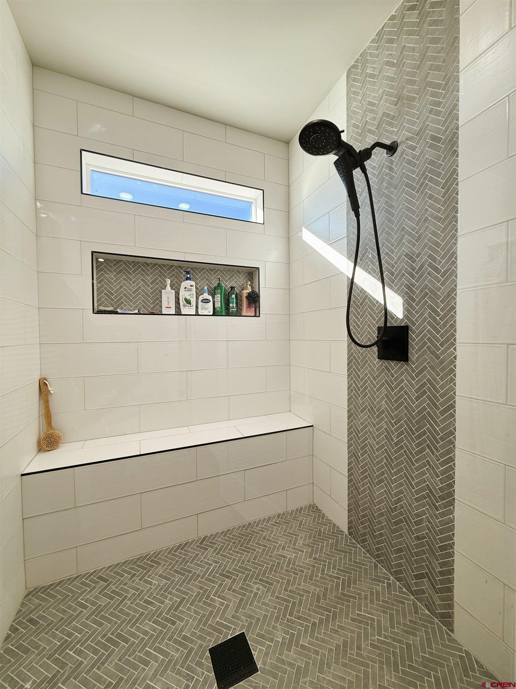 8585 Ellens Way Austin, CO 81410 - Photo 36 of 45 a bathroom with a shower