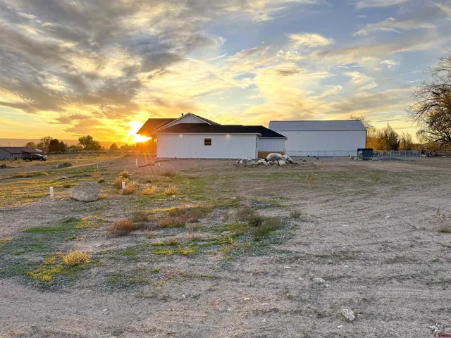 a front view of house with ocean view