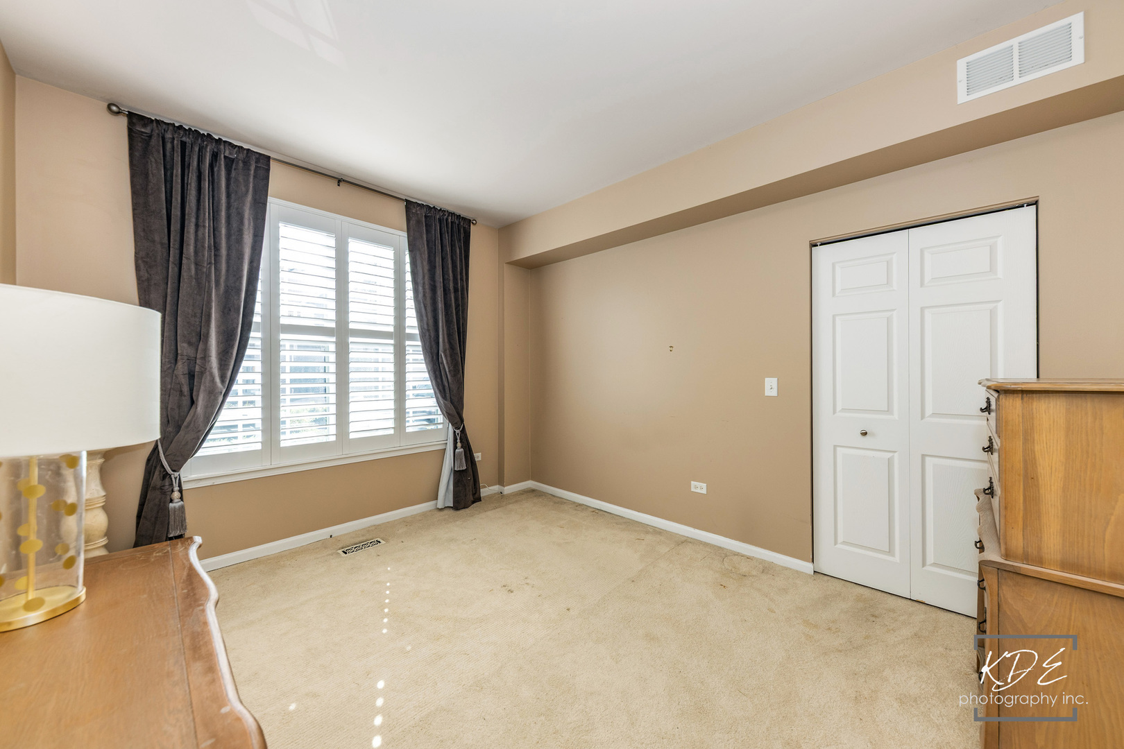 1022 Neudearborn Lane, Unit 191022 Naperville, IL 60563 - Photo 18 of 27 a view of an empty room with a window