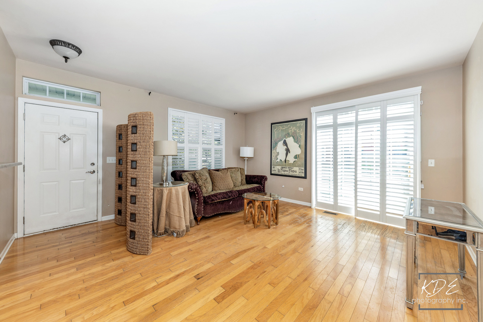 1022 Neudearborn Lane, Unit 191022 Naperville, IL 60563 - Photo 3 of 27 a view of a livingroom with furniture and wooden floor