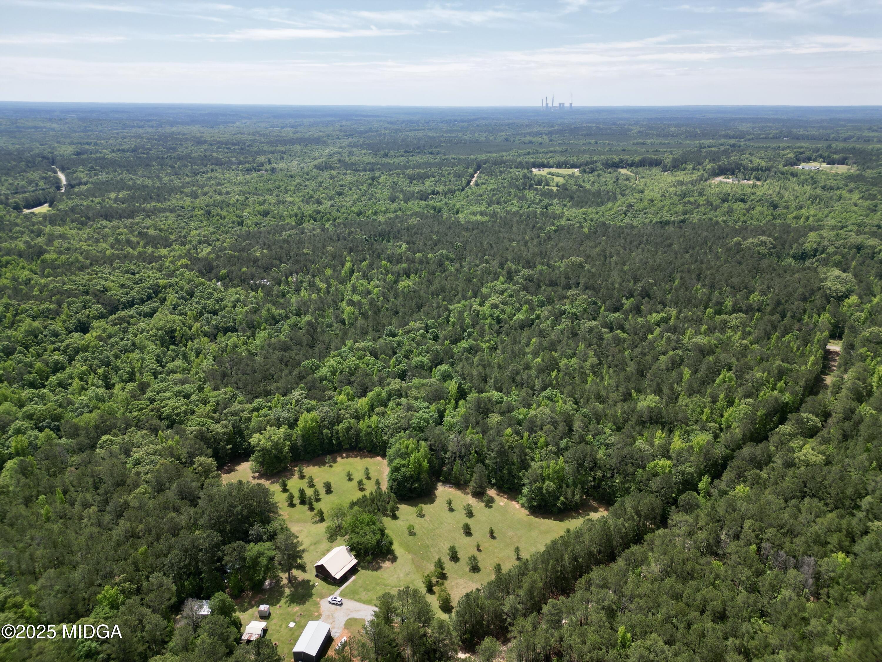 0 Samples Road Forsyth, GA 31029 - Photo 3 of 13 a view of a green field with lots of bushes