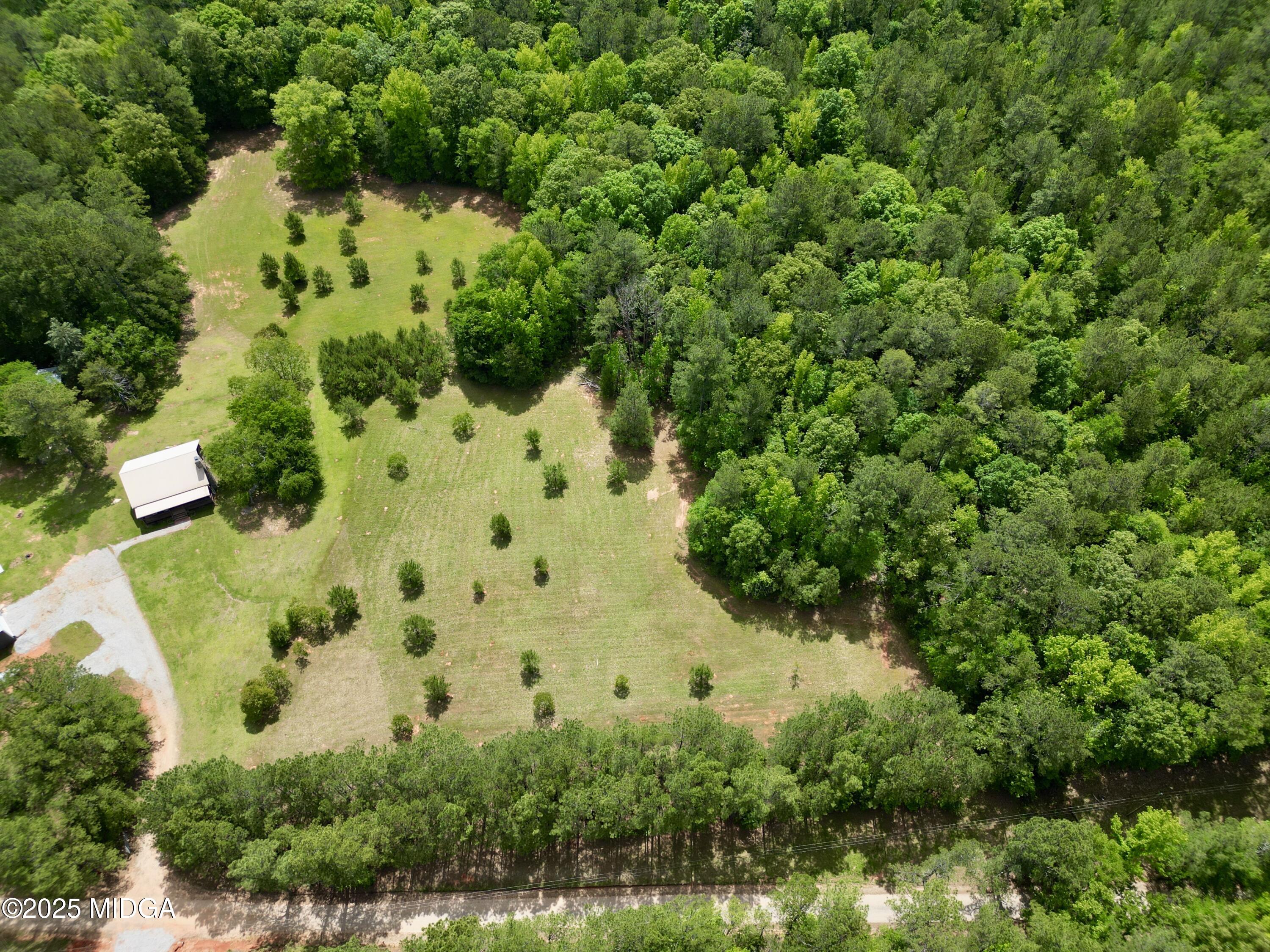 0 Samples Road Forsyth, GA 31029 - Photo 7 of 13 an aerial view of a residential houses with yard