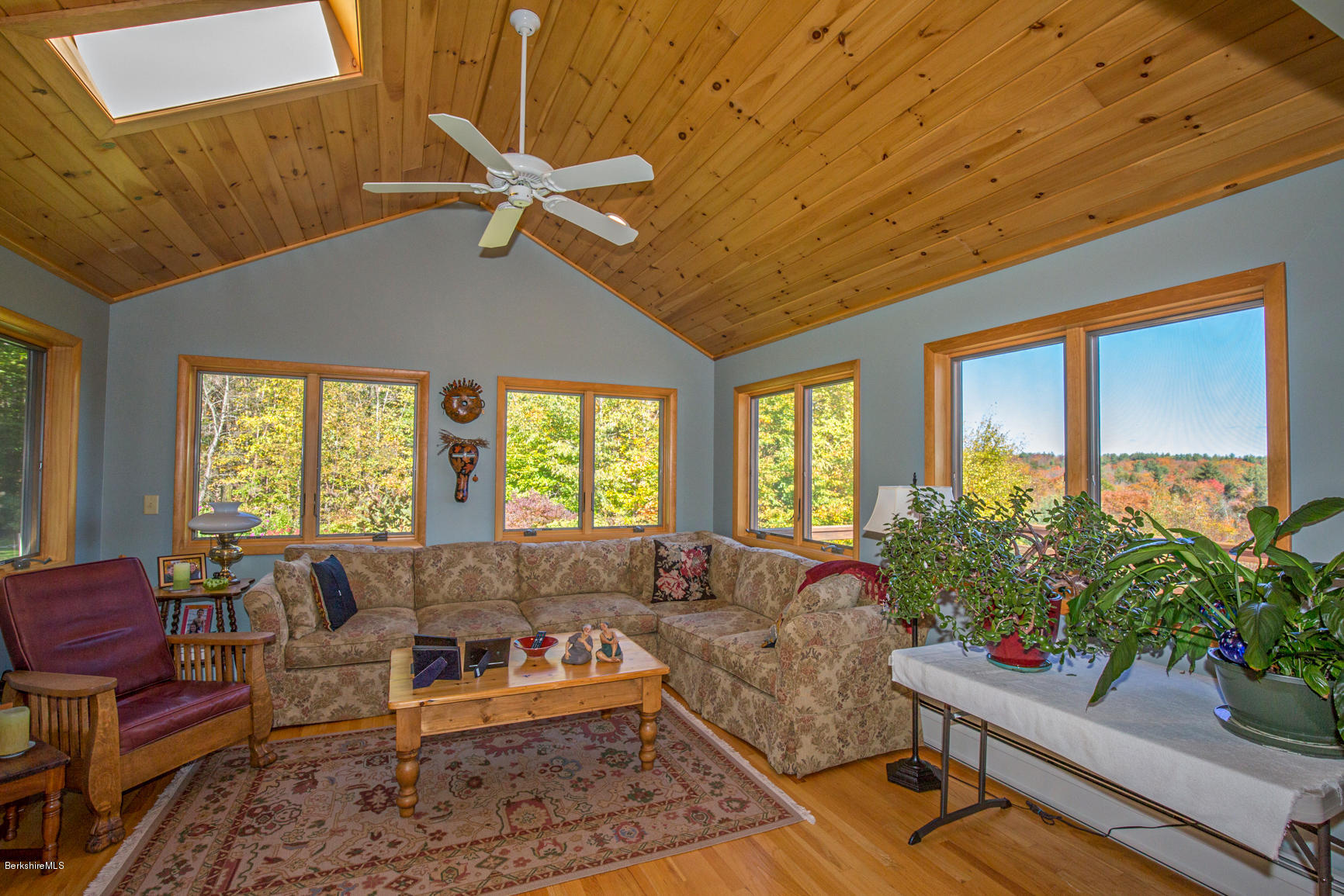 358 Harrington Road Otis, MA 01253 - Photo 14 of 52 a living room with furniture and a potted plant