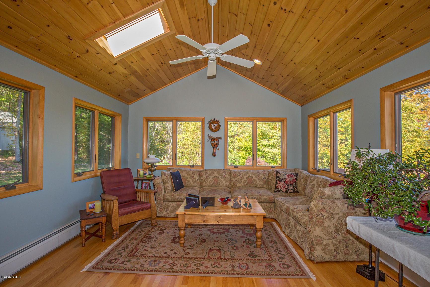 358 Harrington Road Otis, MA 01253 - Photo 15 of 52 a living room with furniture and a large window