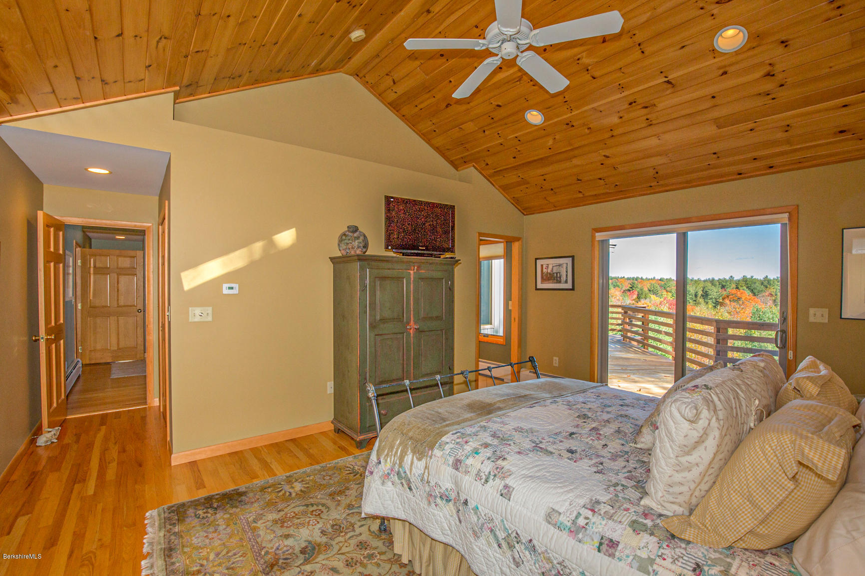 358 Harrington Road Otis, MA 01253 - Photo 19 of 52 a bedroom with a bed and a large window with the outer view