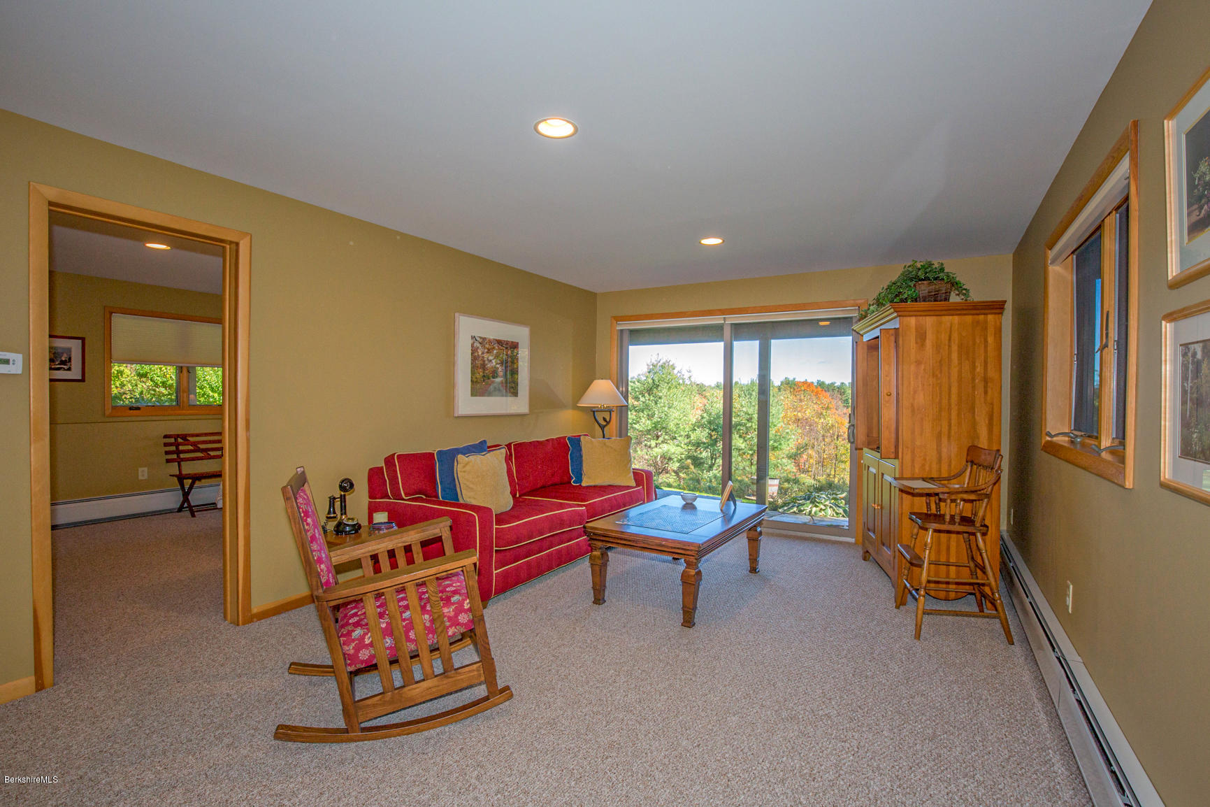 358 Harrington Road Otis, MA 01253 - Photo 28 of 52 a living room with furniture a rug and a window