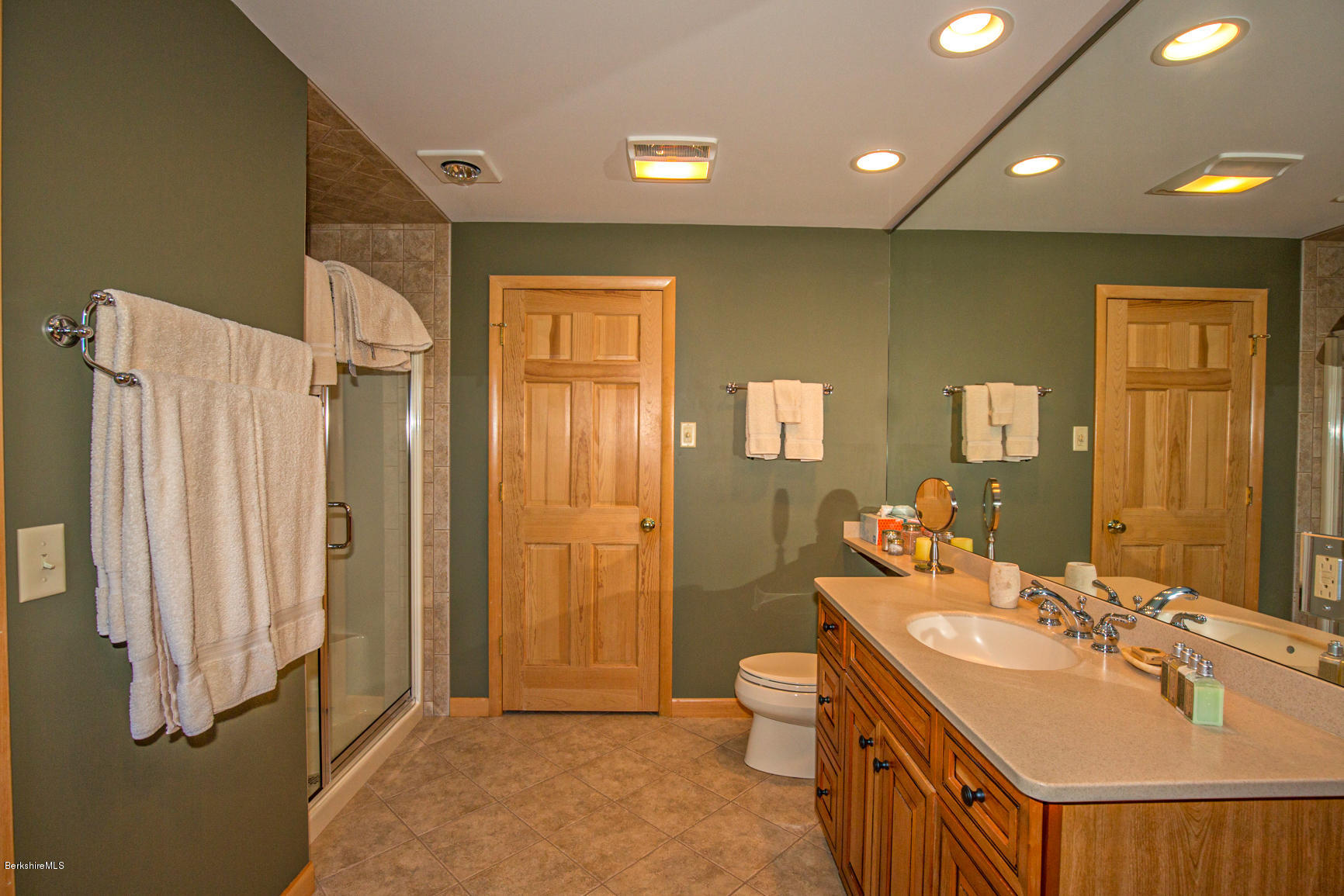 358 Harrington Road Otis, MA 01253 - Photo 32 of 52 a bathroom with a double vanity sink toilet and shower