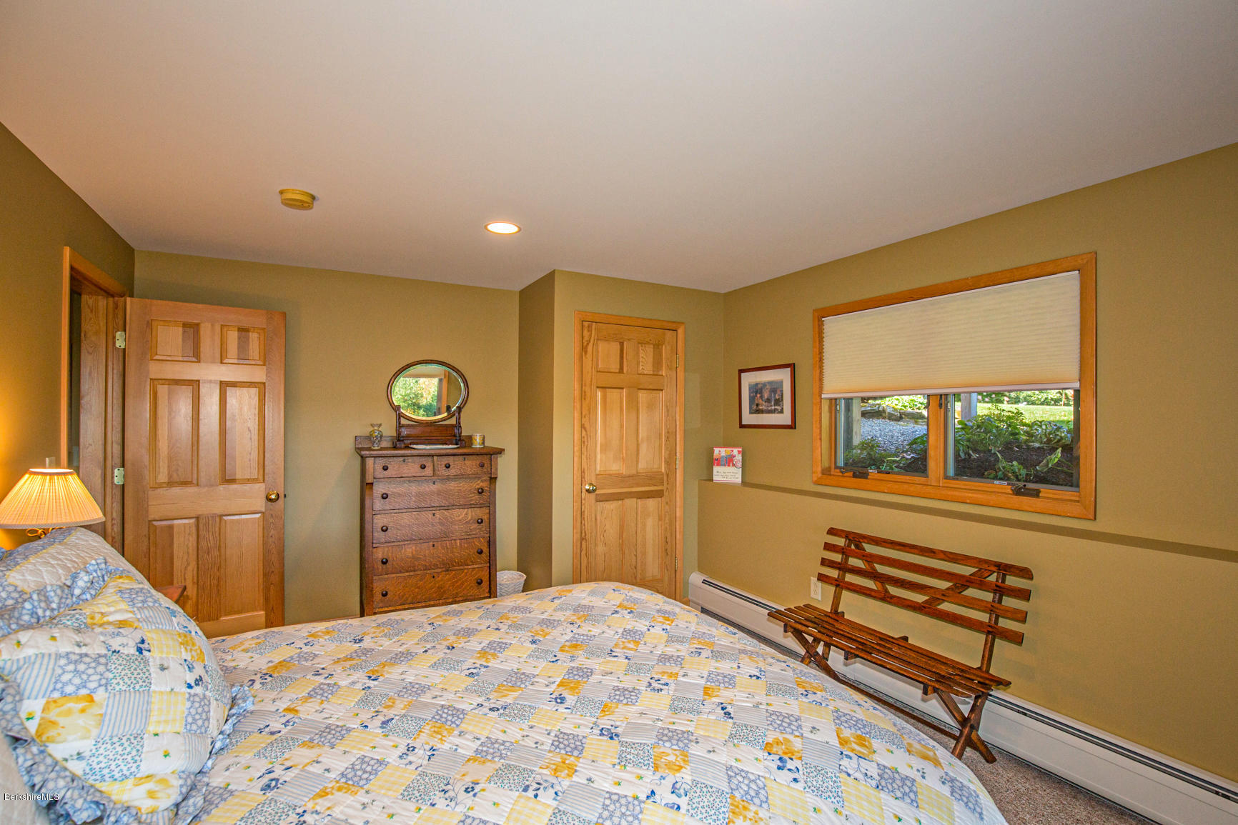 358 Harrington Road Otis, MA 01253 - Photo 34 of 52 a bedroom with a bed and a flat screen tv