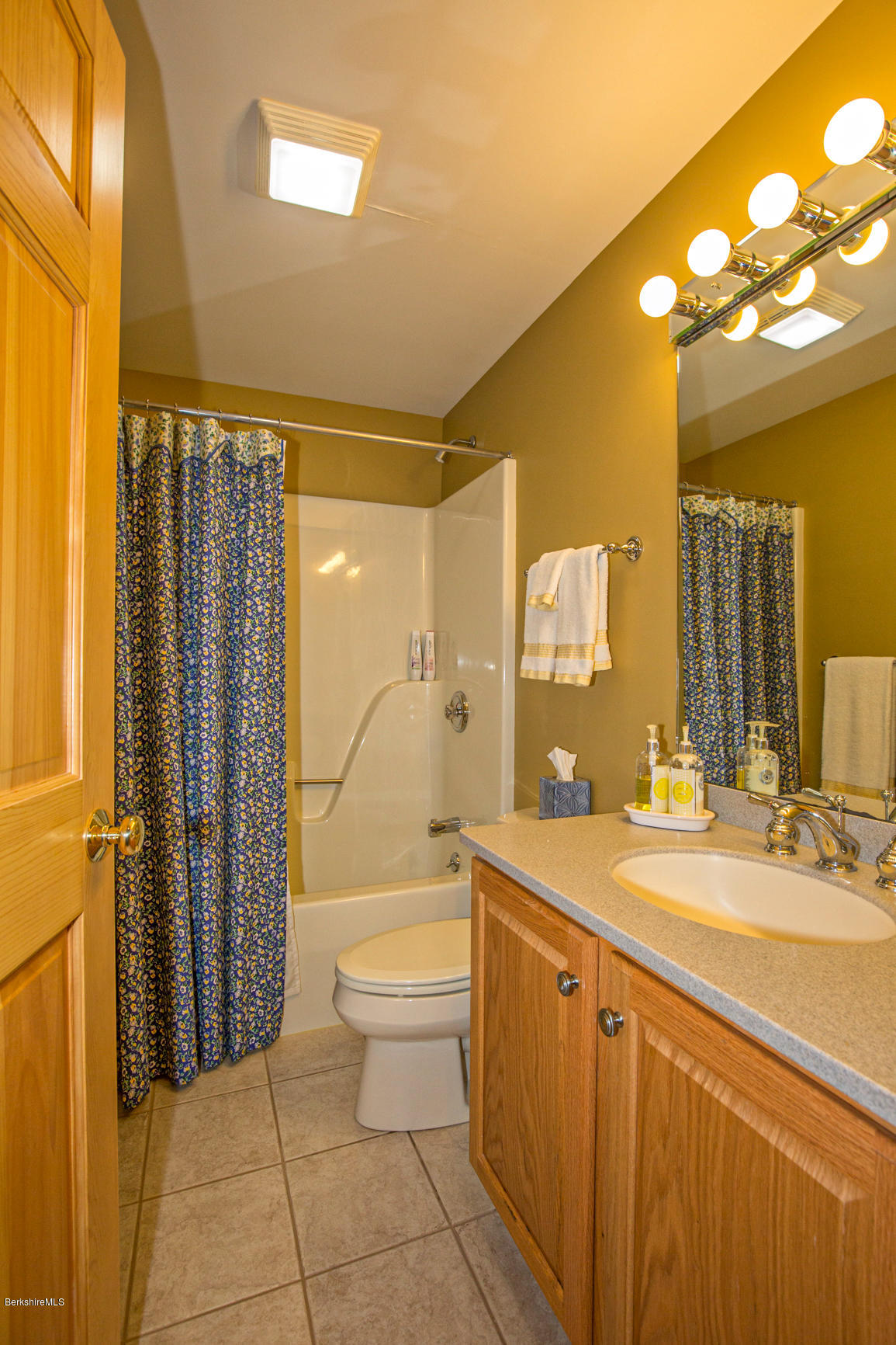 358 Harrington Road Otis, MA 01253 - Photo 36 of 52 a bathroom with a double vanity sink toilet mirror and shower