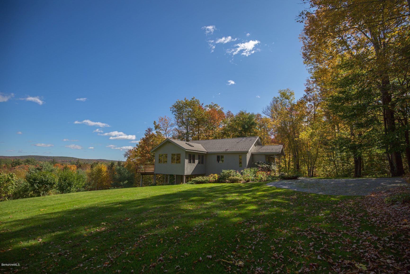 358 Harrington Road Otis, MA 01253 - Photo 38 of 52 a view of a house with a big yard